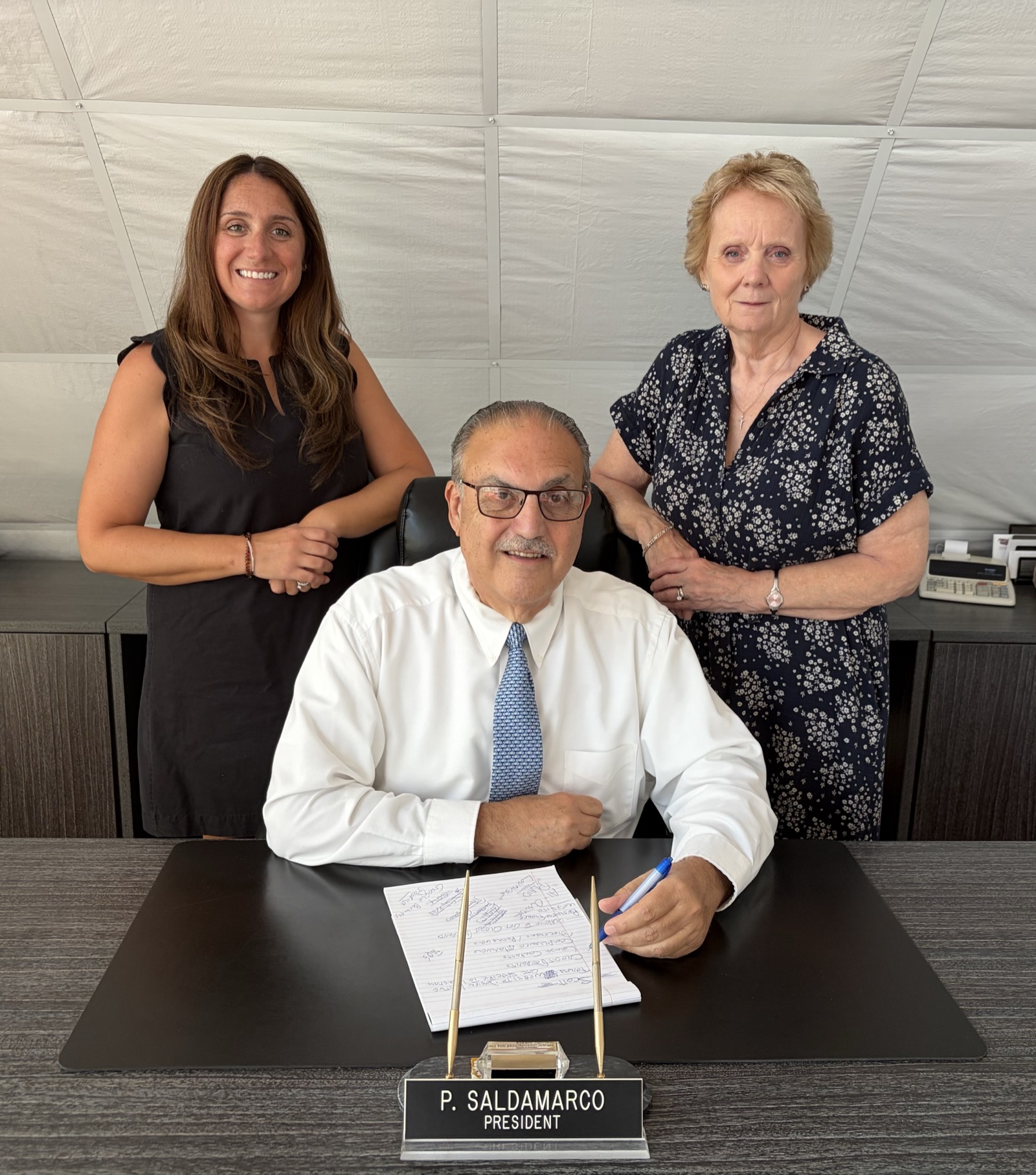 Christina Tatta, Peter Saldamarco, and Sally Saldamarco at the P. Saldamarco, LLC office